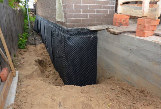 SJ Waterproofing Pros team performing specialized Waterproofing assessment in Minnesota, MN